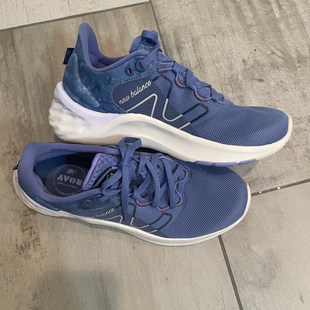 Blue and white size 6 1/2 new balance shoes